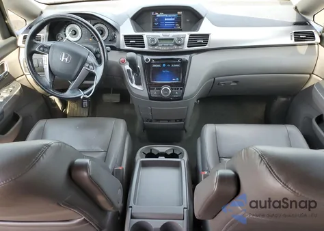 2014 Honda Odyssey Exl z USA, uszkodzony, nr VIN 5FNRL5H60EB127151